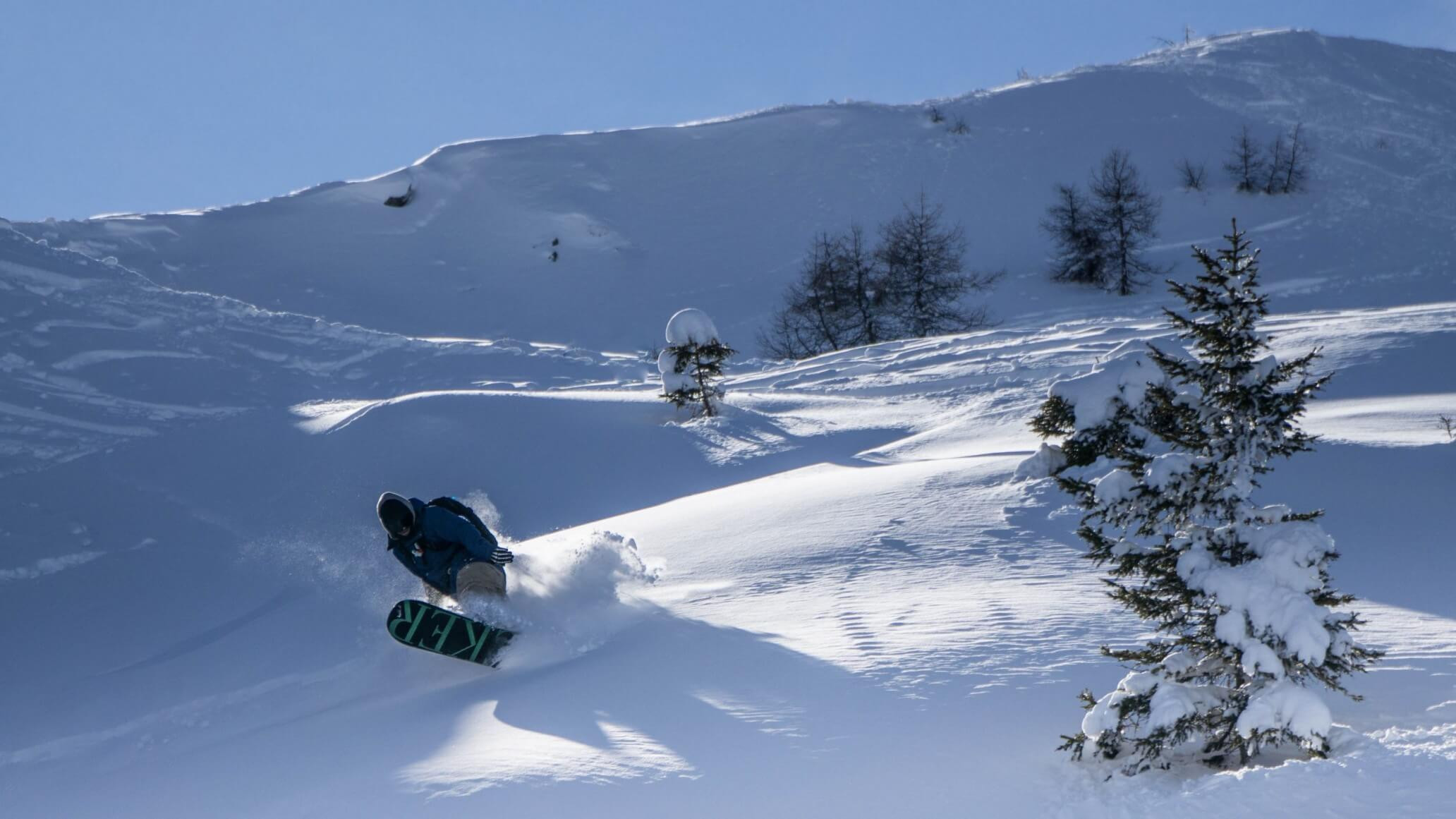 Snowboarder offpiste slope